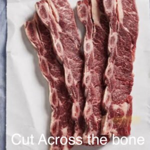 Beef ribs / spare ribs cut across the bone.