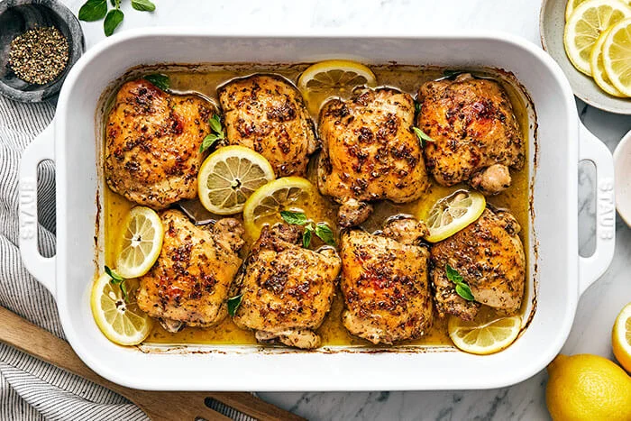 Lemon Herb Chicken Breast served with garlic butter vegetables on a plate