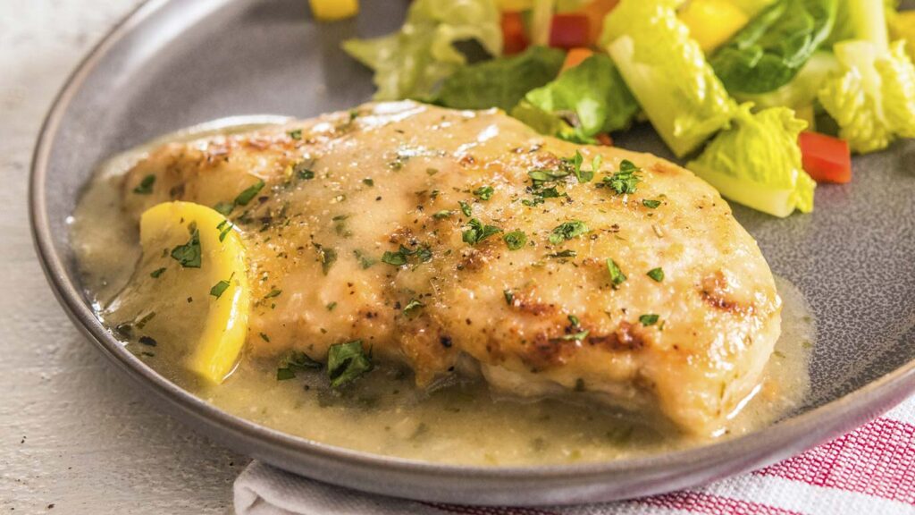 Lemon Herb Chicken Breast served with vegetables